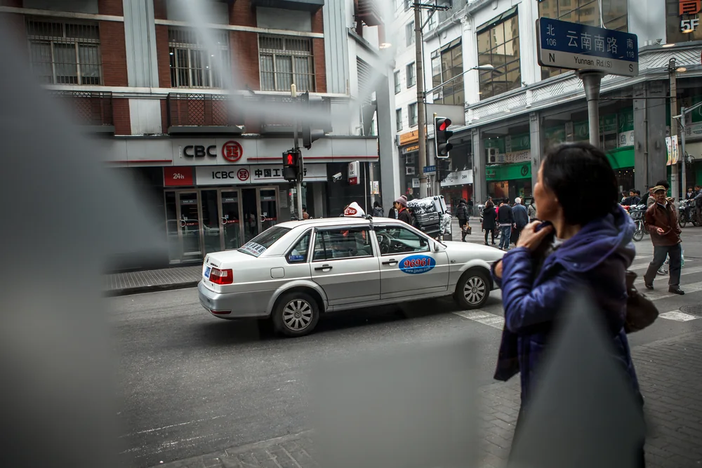 Street Photography in Shanghai, China - Photo No. 9232 by Przemek Wozny