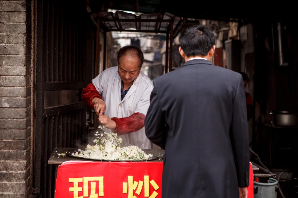 Street Photography in Shanghai, China - Photo No. 9241 by Przemek Wozny