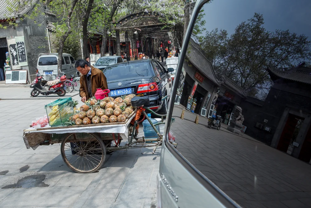 Street Photography in Xian, China - Photo No. 2100 by Przemek Wozny